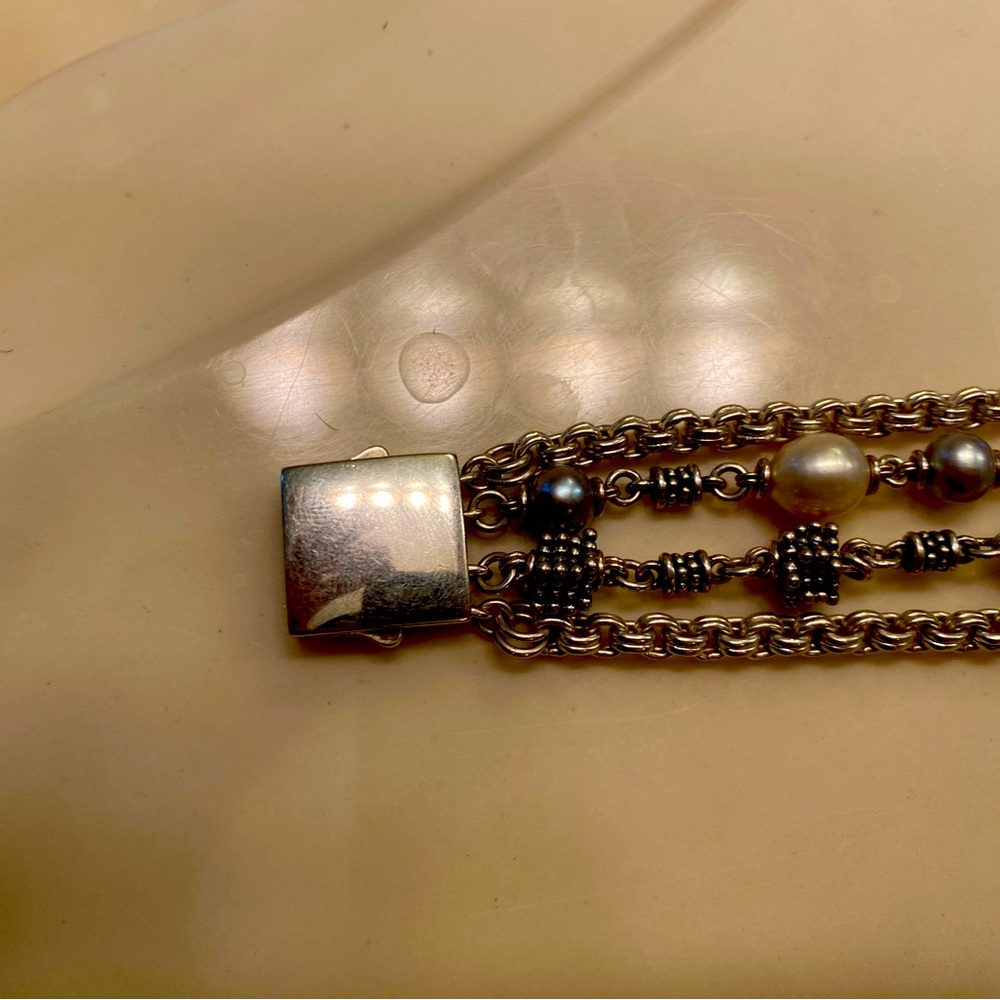 Michael Dawkins silver bracelet four strands
